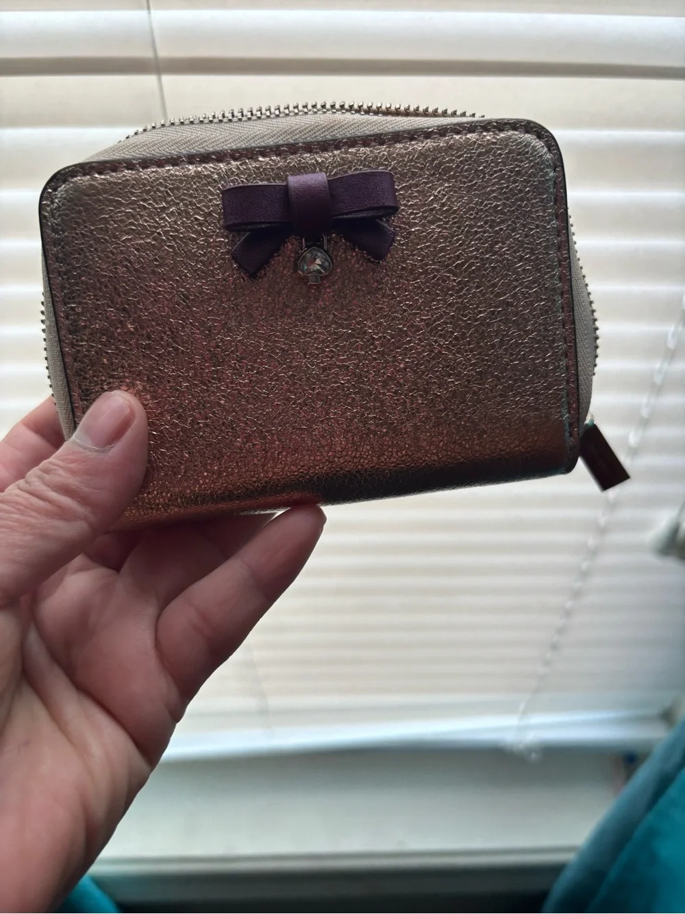 kate spade Rose Gold Metallic Zip Wallet with Purple Bow